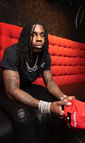 Polo G wearing Polo G Merch cap