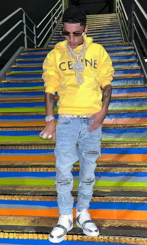 J.I. wearing Louis Vuitton belt