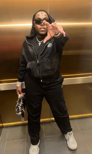 Saucy Santana wearing Balenciaga eyewear