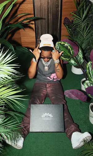 Lil Gotit wearing Spider Worldwide hat