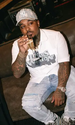 Doe Boy wearing Louis Vuitton shirt