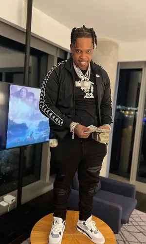 Finesse2tymes wearing Kappa jacket