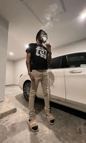 Kankan’s Outfit in Rick Owens Hoodie, Purple Brand Jeans & Balenciaga Sandals (2022)