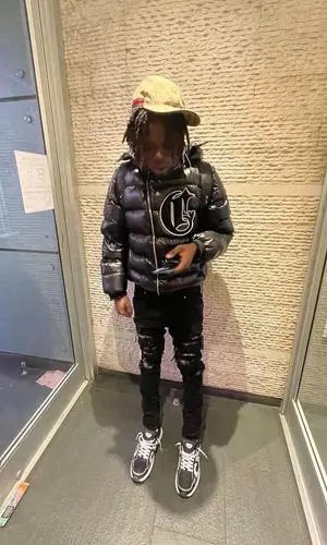 Pasto Flocco wearing Gucci hat