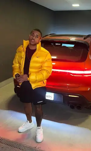 MC Davi wearing Burberry shorts
