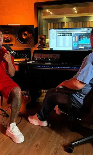 MC Davi wearing Balenciaga shorts