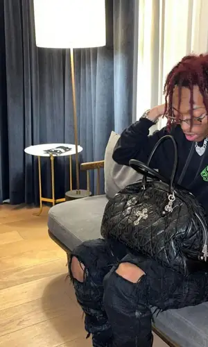 Lil Tecca wearing Chrome Hearts hoody