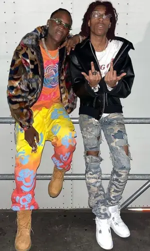 Lil Tecca wearing Enfants Riches Deprimes sweater