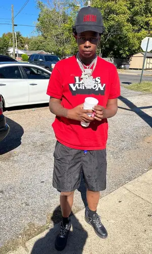 Big Scarr wearing Amiri cap