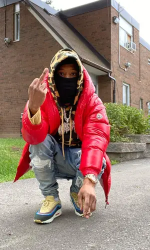 Pressa wearing Amiri jeans