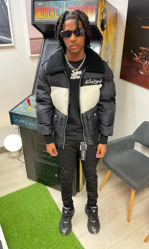 Lil Darius wearing Balenciaga eyewear