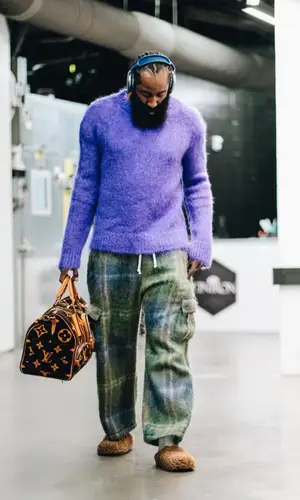 James Harden wearing Louis Vuitton bag