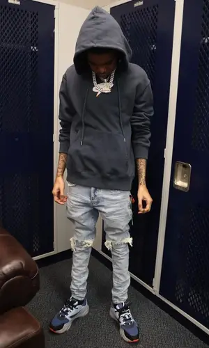 Lil Poppa wearing Off-White hoody