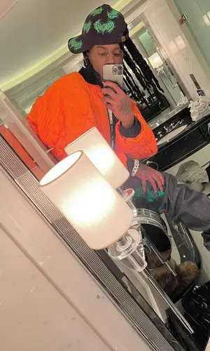 Playboi Carti wearing Playboi Carti Merch cap