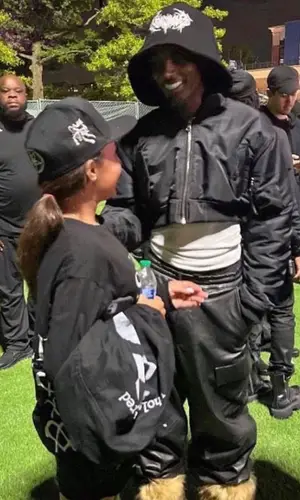 Playboi Carti wearing Playboi Carti Merch jacket