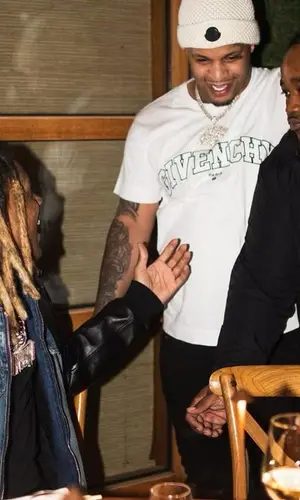 Doodie Lo’s Outfit in Givenchy T-Shirt, Amiri Jeans & Moncler Hat (2022)