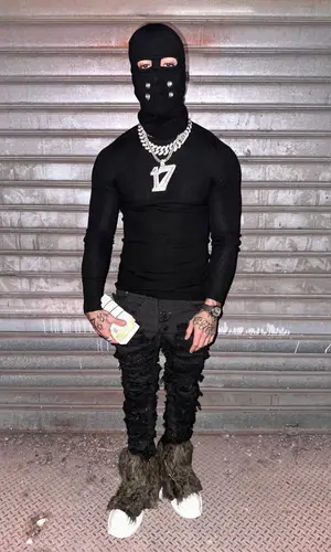 Tony Effe wearing Rick Owens jeans