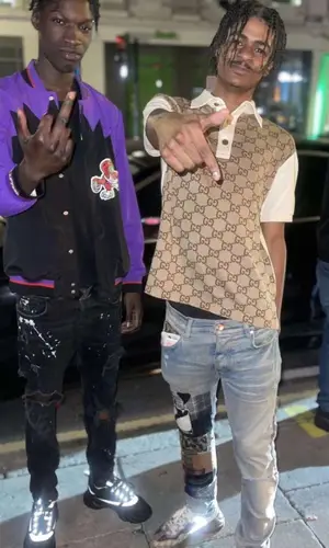BandoKay wearing Gucci shirt