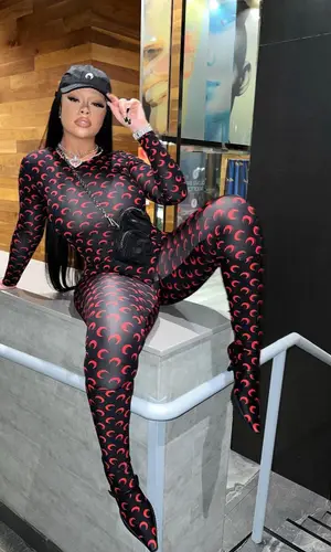 Latto wearing Marine Serre boots