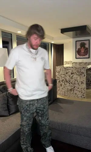 Murda Beatz wearing Louis Vuitton pants