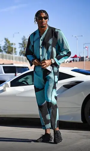 Isaiah Simmons wearing Issey Miyake jacket