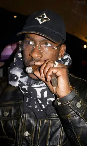 Skepta wearing Louis Vuitton cap