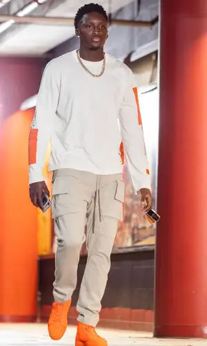 Victor Olapido wearing Heron Preston sweatshirt