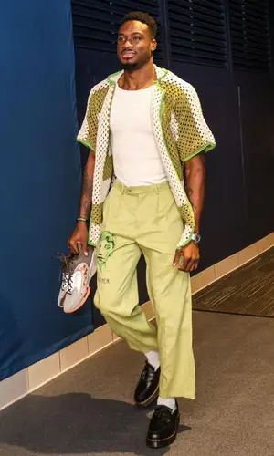 Thanasis Antetokounmpo wearing KidSuper pants