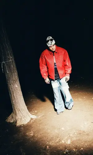 Yung Lean wearing Supreme jacket