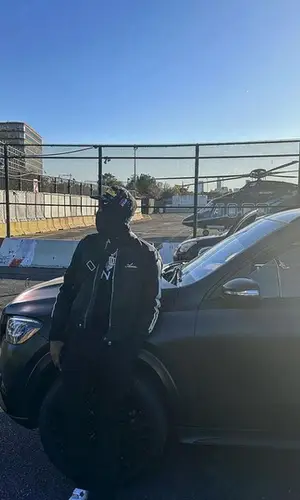 Meek Mill wearing Givenchy sweater