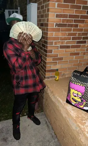 Lil Double 0 wearing Givenchy shirt
