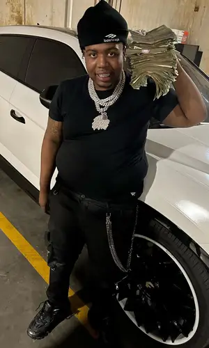 Big30 wearing Paper Planes t-shirt