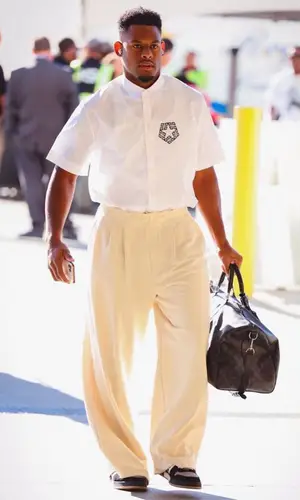 JuJu wearing Louis Vuitton bag