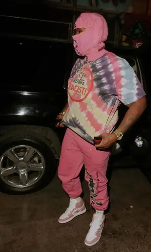 Peezy wearing Nike sock