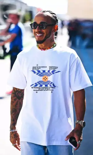Lewis Hamilton wearing Plus44 t-shirt