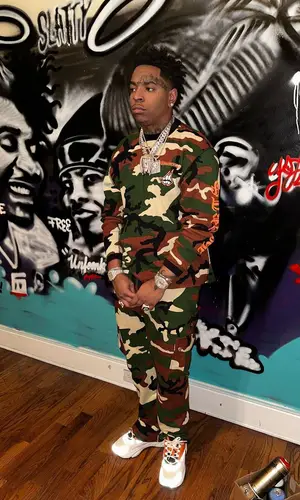 Lil Gotit wearing Chrome Hearts t-shirt