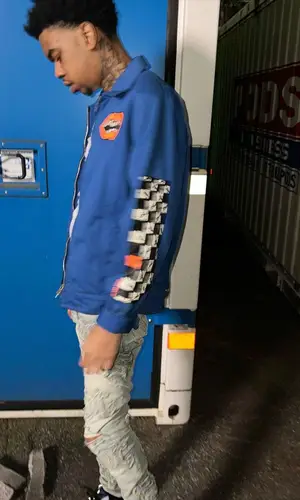 Lil Poppa wearing Chrome Hearts jacket