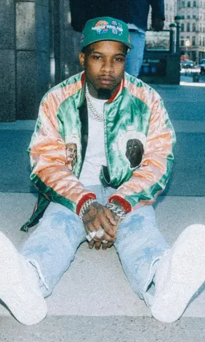 Tory Lanez’s Outfit in Saint Michael Jacket, Nike Sneakers & Better With Age Cap (2022)