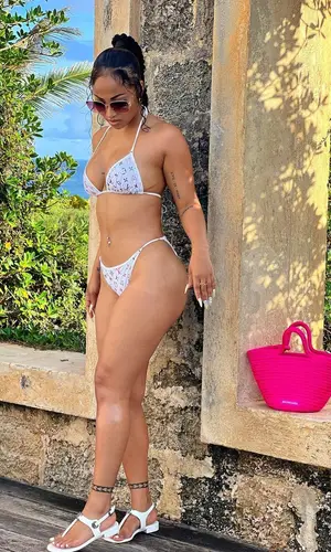 Shenseea wearing Louis Vuitton swimwear