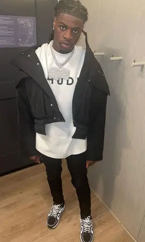 SleazyWorld Go wearing Rhude t-shirt