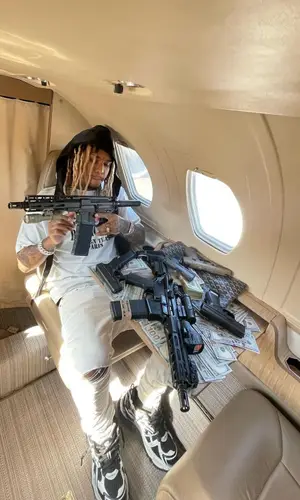 Lil Gnar wearing Valabasas jeans