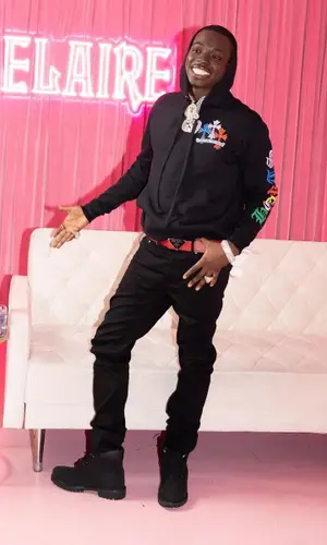 Bobby Shmurda wearing Prada belt