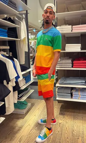 Young Mascka wearing Lacoste shorts