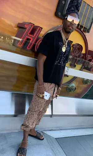 Lil Murden wearing Louis Vuitton t-shirt
