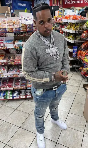 Finesse2tymes wearing Gucci belt