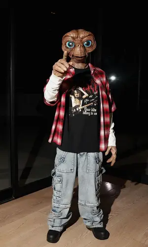 Tyga wearing Bottega Veneta boots