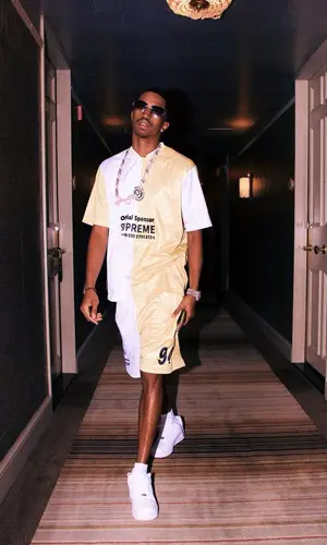Christian Combs wearing Supreme jersey