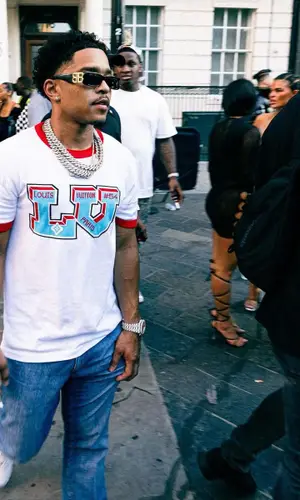Justin Dior Combs wearing Louis Vuitton t-shirt