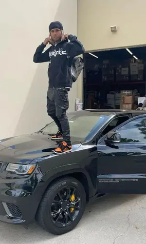 Lil Gnar’s Outfit in Rick Owens Jeans, Dior Belt & Goyard Backpack (2022)