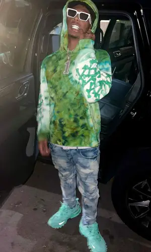 Mikey wearing Louis Vuitton eyewear